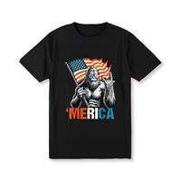 T – Shirt with a Fun Twist: Iconic Bigfoot Figure Holding Flag and Making Hand Gesture with ‘Merica’ for a Light – hearted Patriotic Vibe